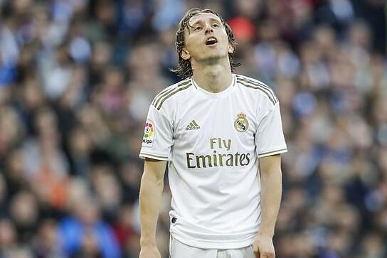 为什么投手在换局休息间隙需要穿着重压服来防止手臂冷缩